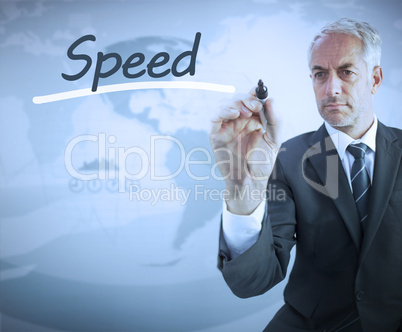 Businessman writing the word speed