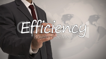 Businessman writing the word efficiency