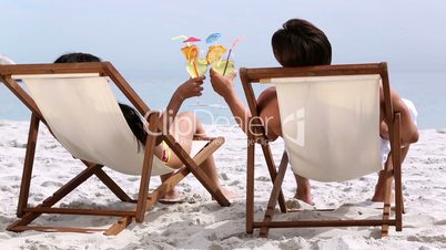 Lovely couple drinking cocktails