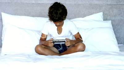 Little boy playing a video game
