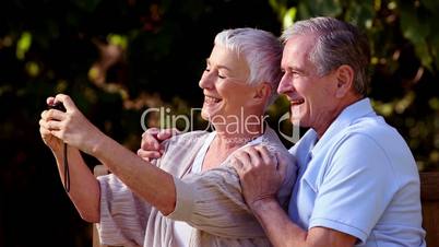 Mature couple taking self pictures