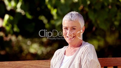 Smiling mature woman looking at camera