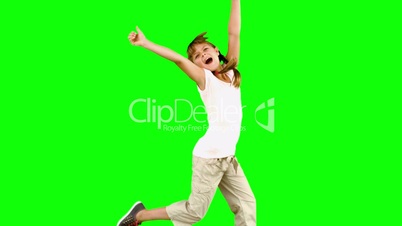 Little girl jumping on green screen