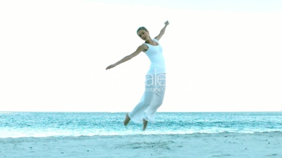Girl Jumping on the beach