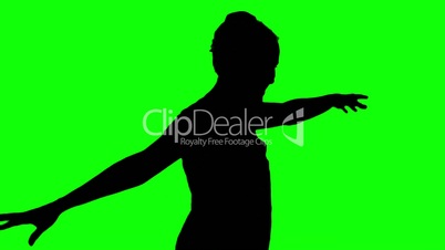 Silhouette of woman listening to music on green screen