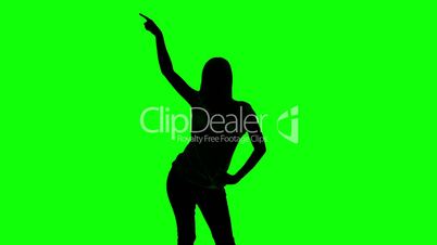 Silhouette of woman doing disco gesture on green screen