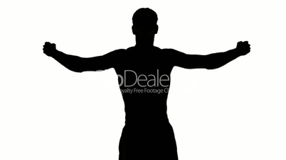 Silhouette of a man stretching arms on white background