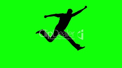 Silhouette of a man gesturing as superman on green screen