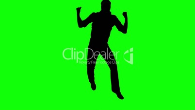 Silhouette of a jumping man celebrating something on green screen