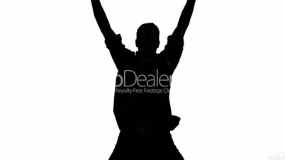 Silhouette of jumping man on white background