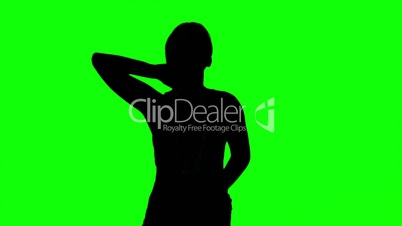 Silhouette of woman with hand on the neck on green screen