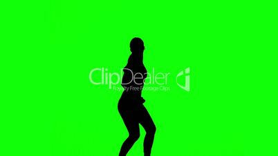 Silhouette of woman working out on green screen