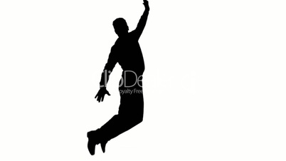 Silhouette of man jumping raising legs on white background