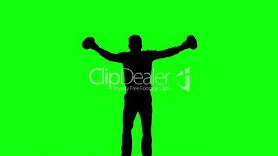 Silhouette of man jumping and boxing on green screen