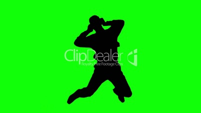 Silhouette of a man jumping and listening to music on green screen
