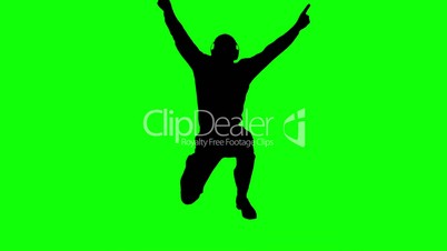Silhouette of a man enjoying music and jumping on green screen