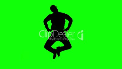 Silhouette of a man jumping with hands on hips on green screen