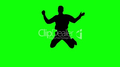 Silhouette of a man jumping and raising legs on green screen