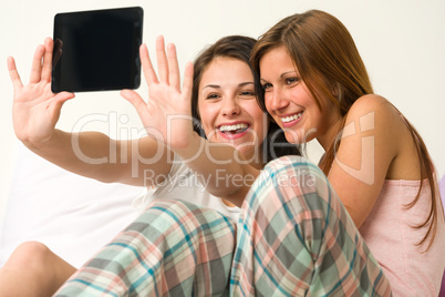 Pretty young girls taking pictures of themselves