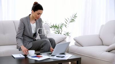 Businesswoman working on a laptop