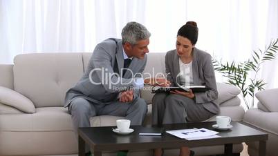 Businessman arranging an appointment with a colleague