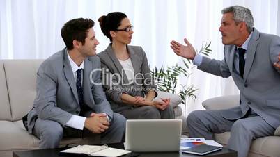 Group of business people gesturing during a meeting