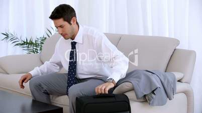 Young businessman sitting in a waiting room