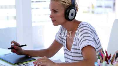 Woman working with headphone