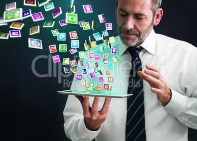 Tablet PC with cloud of application icons