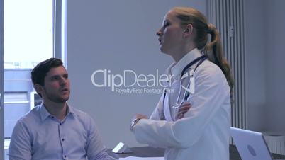 Male patient consulted by a female doctor