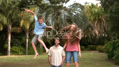 Children jumping on a trampoline