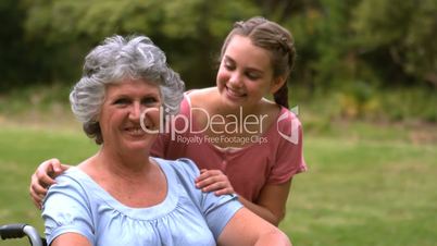 Smiling grandmother with her grand-daughter