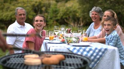 Cheerful family waiting for the barbecue