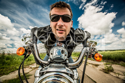 Biker racing on the road