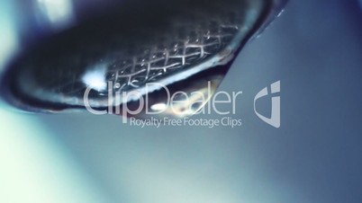 dropping faucet close-up slowmotion