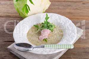 cabbage soup with arugula and prosciutto