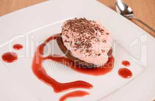 Sweet cake with strawberry cream and chocolate