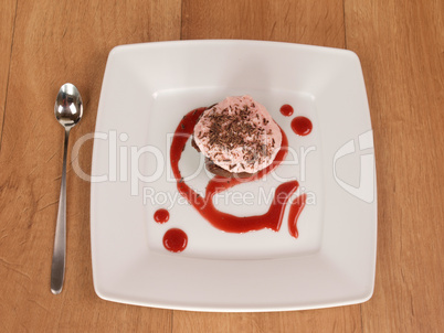 Sweet cake with strawberry cream and chocolate