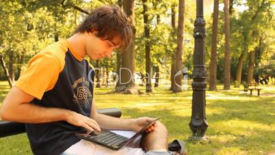 young man and laptop