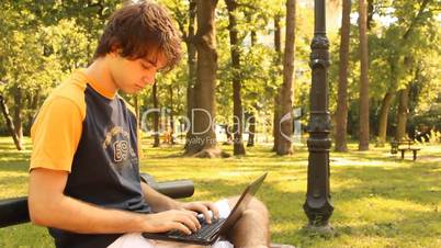 young man and laptop