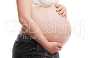 pregnant woman touching or bonding her abdomen