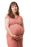 Pregnant woman touching or bonding her abdomen