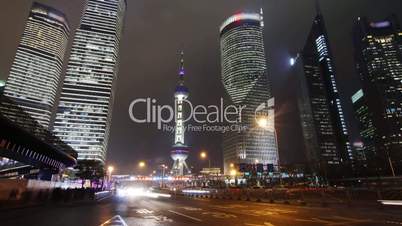 Shanghai landmark and city traffic at night