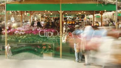 Time lapse of  flower shop in the open-air market