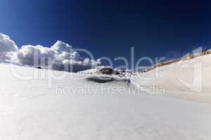 snow slope with cornice