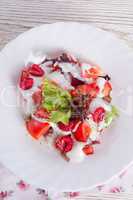salad with dressing and fresh raspberry
