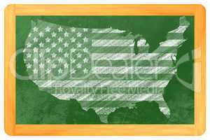 US-Flagge in USA Form an einer Tafel - USA shaped us flag on a b