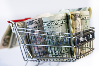 shopping trolley full dollar bill