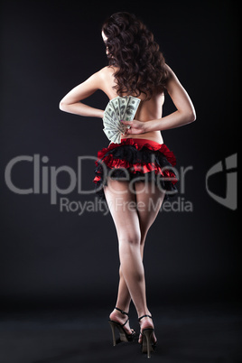Image of topless flamenco dancer with dollars