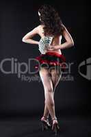 Image of topless flamenco dancer with dollars